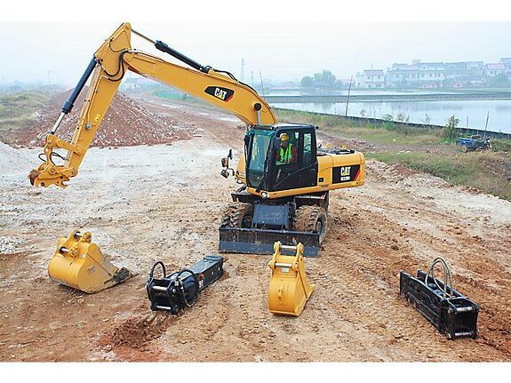 Аренда колесного экскаватора Caterpillar M320D2 с грейфером